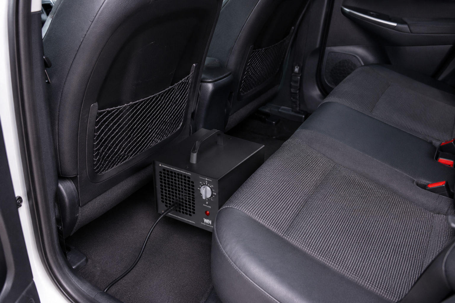 Ozone generator running inside a vehicle for odor removal