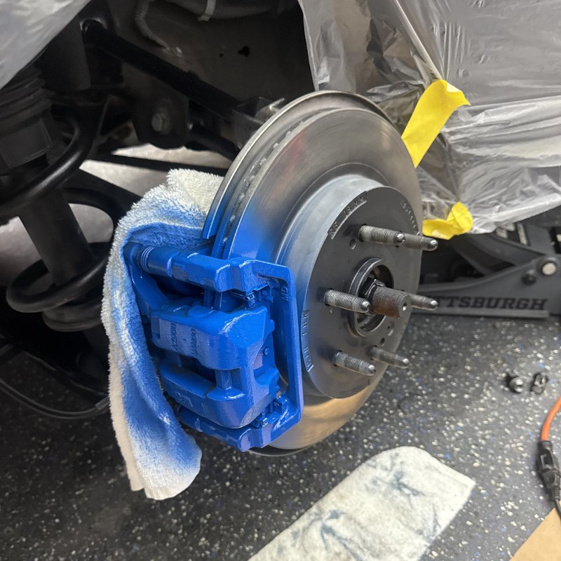 Custom-painted blue brake caliper